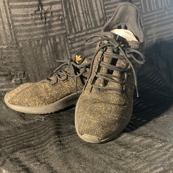 Adidas Woman’s Tubular Shadow Black and Gold Glitter Knit Sneakers - Picture 1 of 3